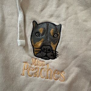 Miss Peaches Beige Hoodie with Embroidered Dog Design